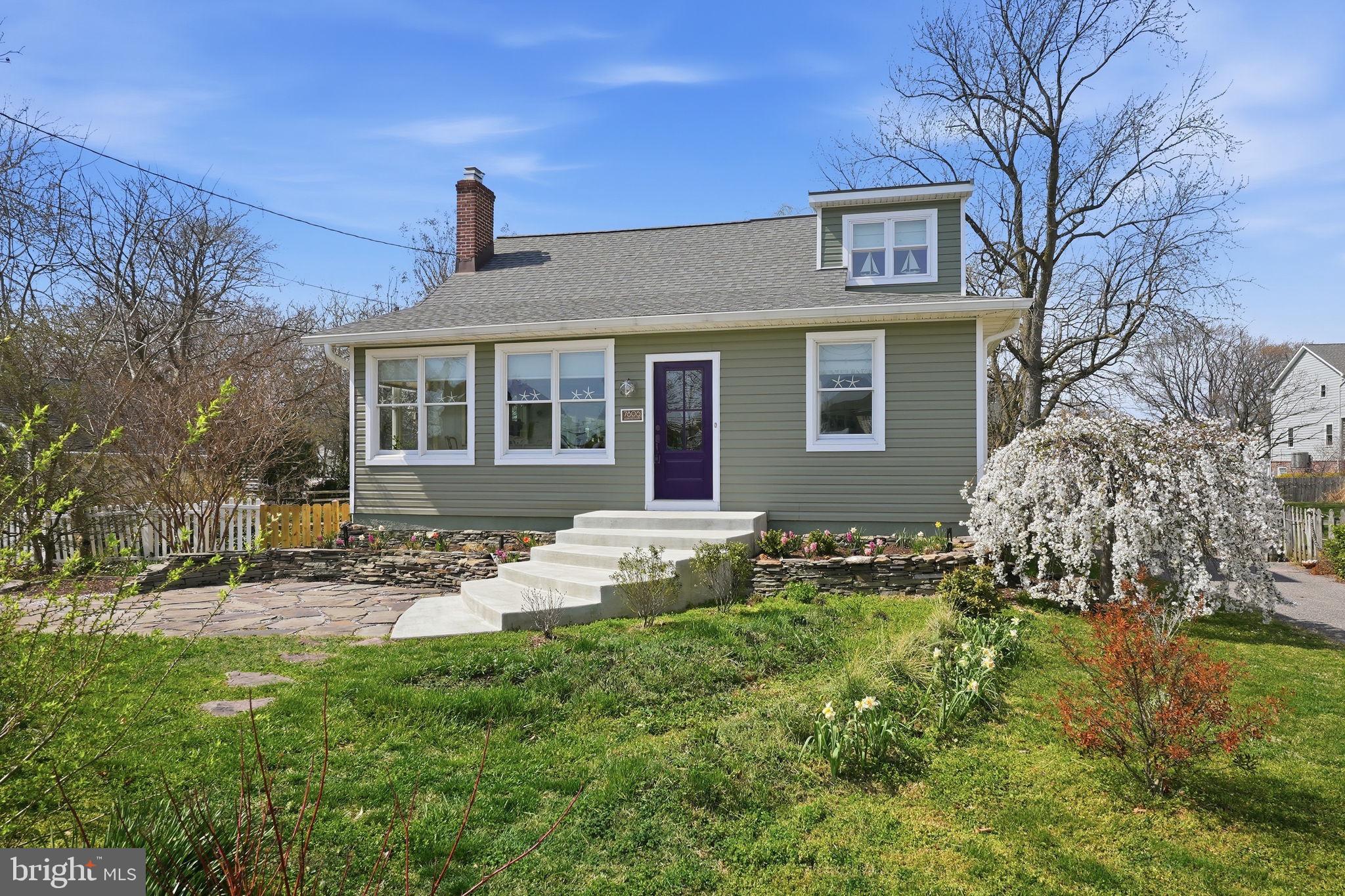 7806 Summit Drive Pasadena, MD 21122 - Photo 50 of 74 a front view of house with yard