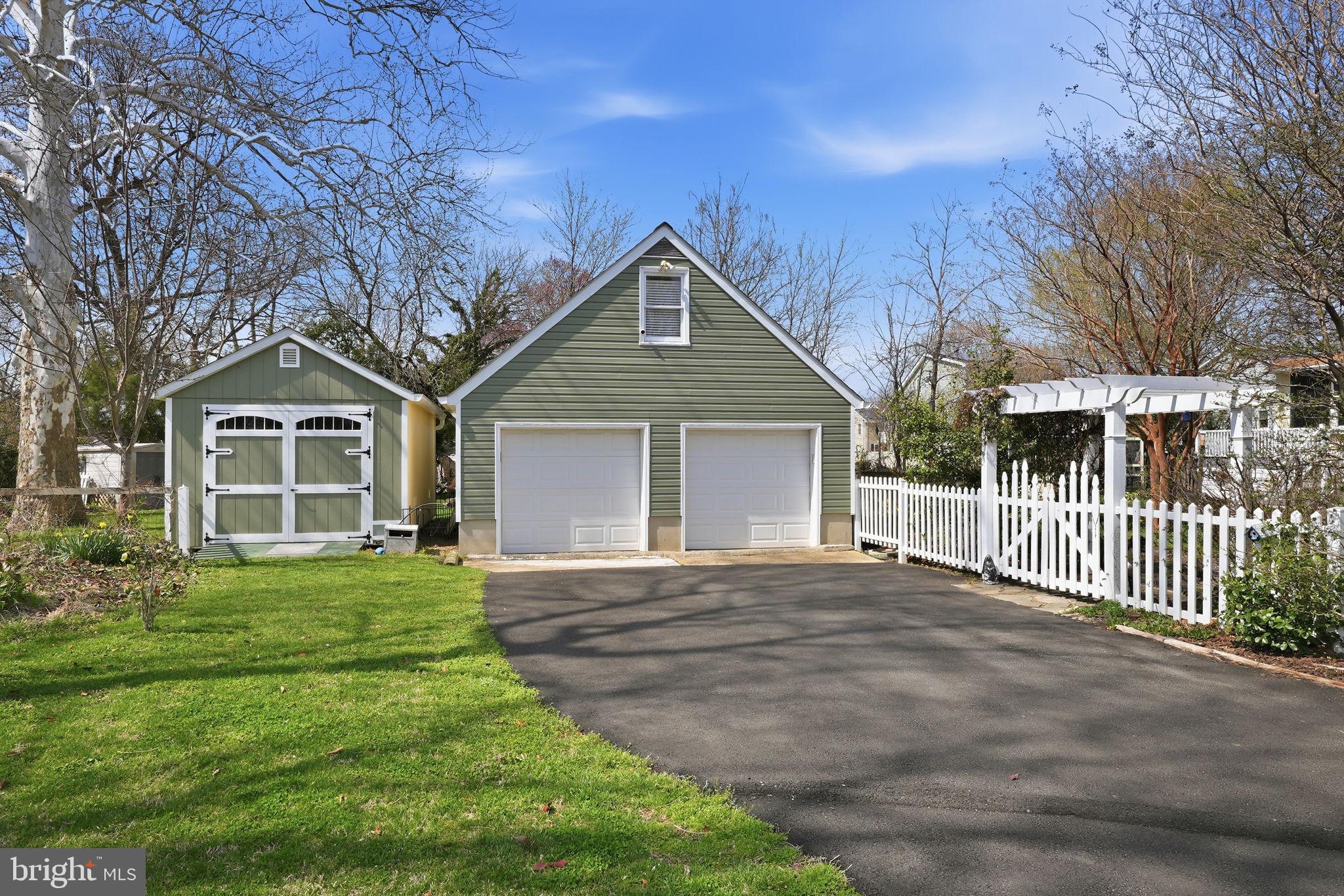 7806 Summit Drive Pasadena, MD 21122 - Photo 51 of 74 a front view of a house with a yard