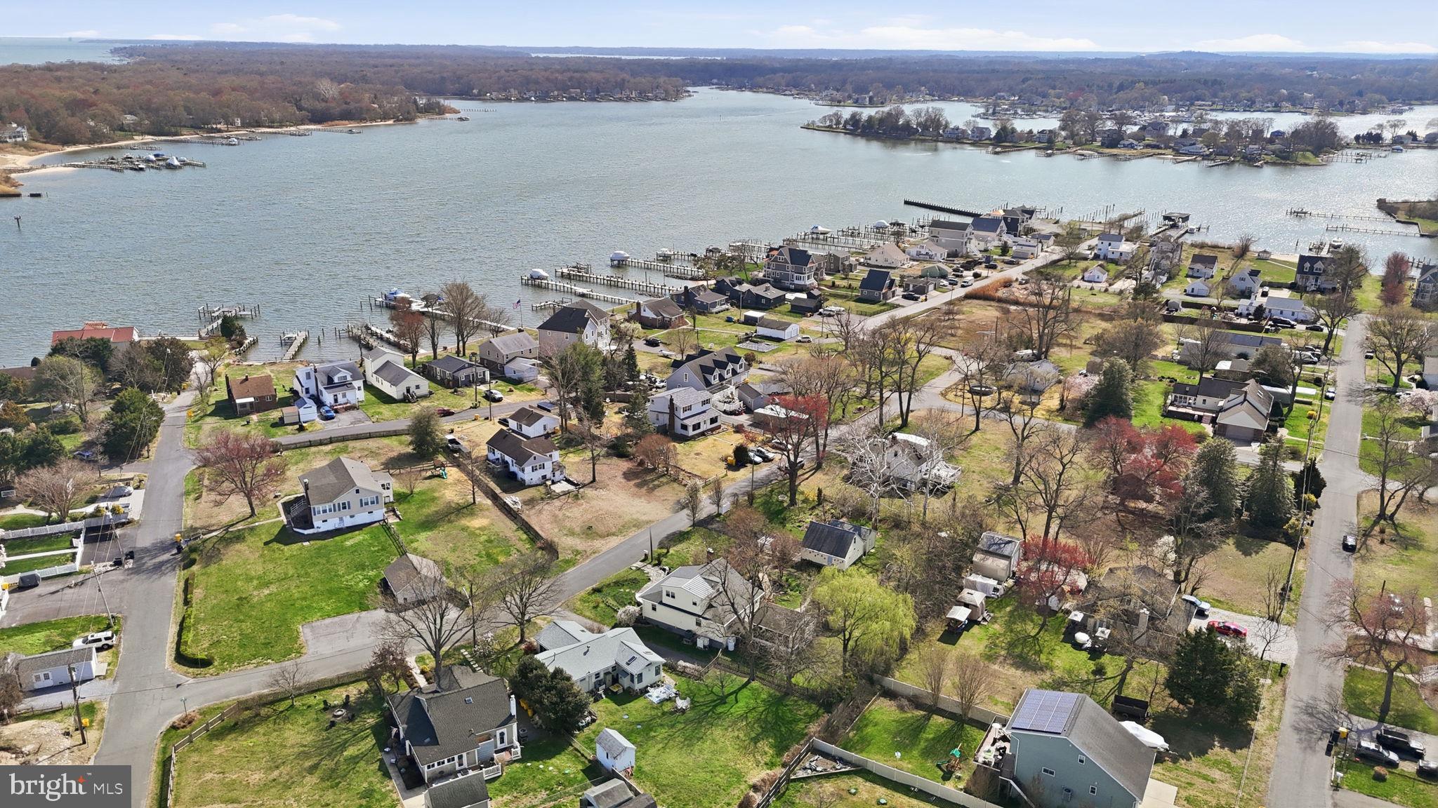 7806 Summit Drive Pasadena, MD 21122 - Photo 67 of 74 an aerial view of a city with lake view