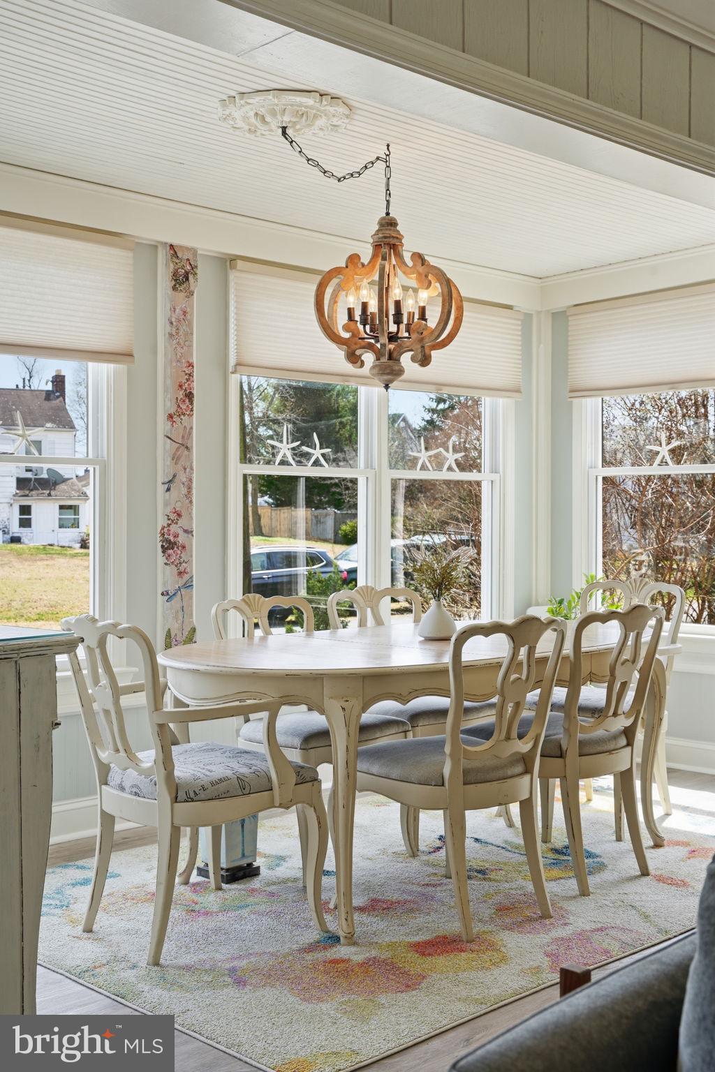 7806 Summit Drive Pasadena, MD 21122 - Photo 10 of 74 a view of a dining room with furniture window and outside view