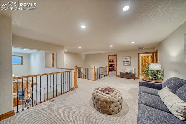 a living room with furniture window and a couch