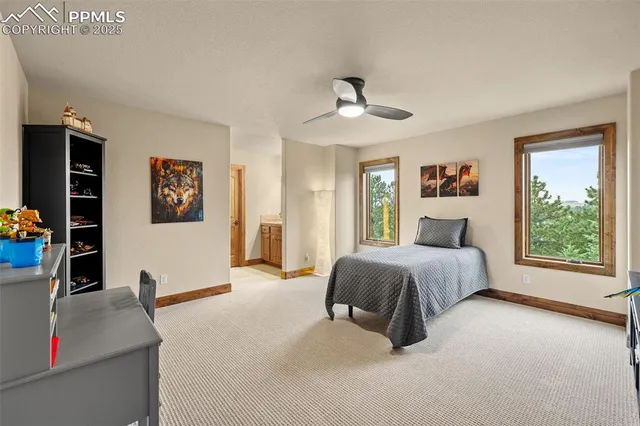 a spacious bedroom with a large bed and a window