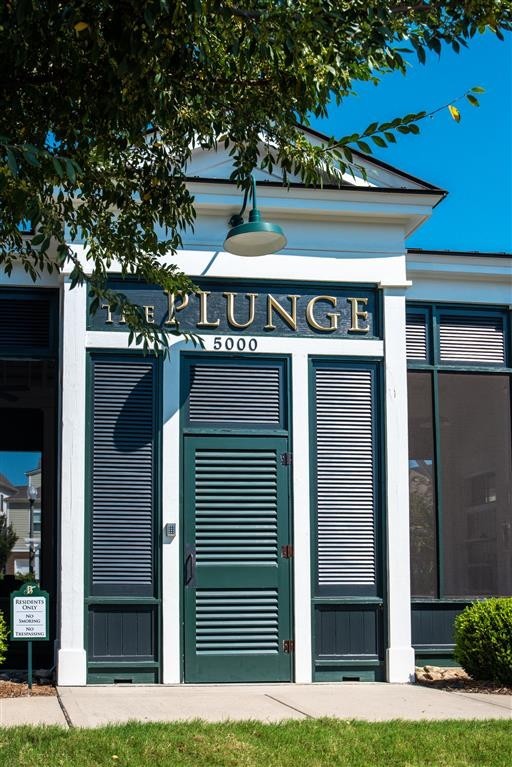 6151 Rural Plains Circle, Unit 301 Franklin, TN 37064 - Photo 15 of 17 a view of a house with a small yard and large tree