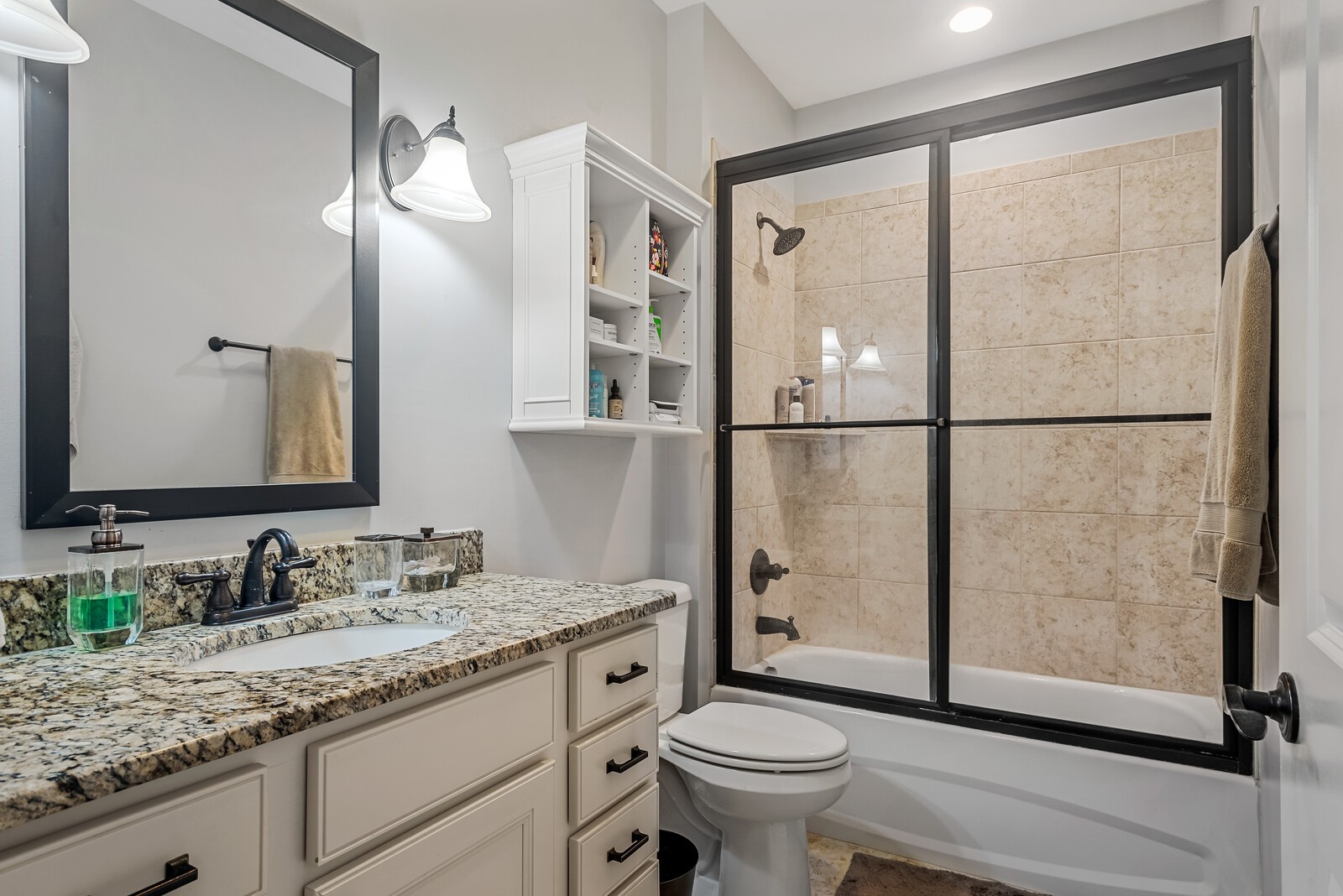 6151 Rural Plains Circle, Unit 301 Franklin, TN 37064 - Photo 8 of 17 a bathroom with a granite countertop sink toilet and shower