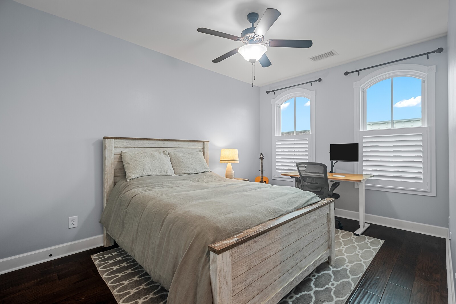 6151 Rural Plains Circle, Unit 301 Franklin, TN 37064 - Photo 9 of 17 a bedroom with a bed and a chandelier