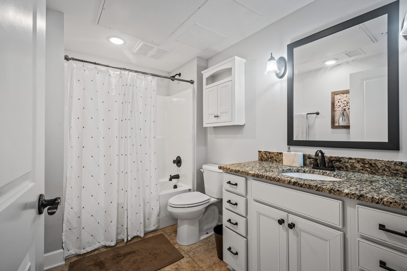 6151 Rural Plains Circle, Unit 301 Franklin, TN 37064 - Photo 10 of 17 a bathroom with a granite countertop sink toilet and shower