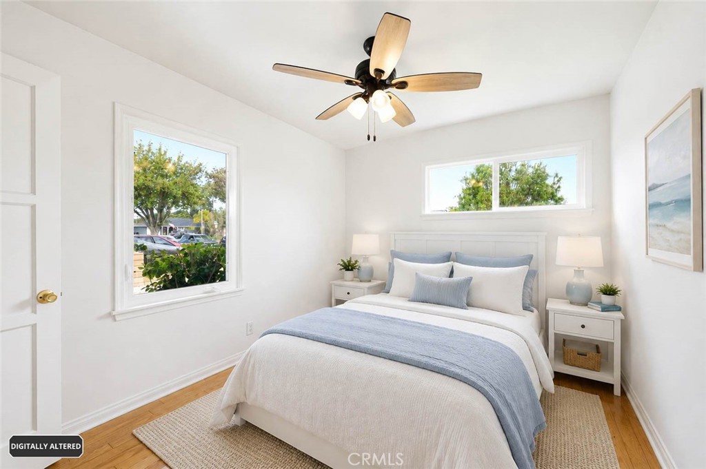 10539 Gridley Road Santa Fe Springs, CA 90670 - Photo 20 of 29 a bedroom with a bed and a window