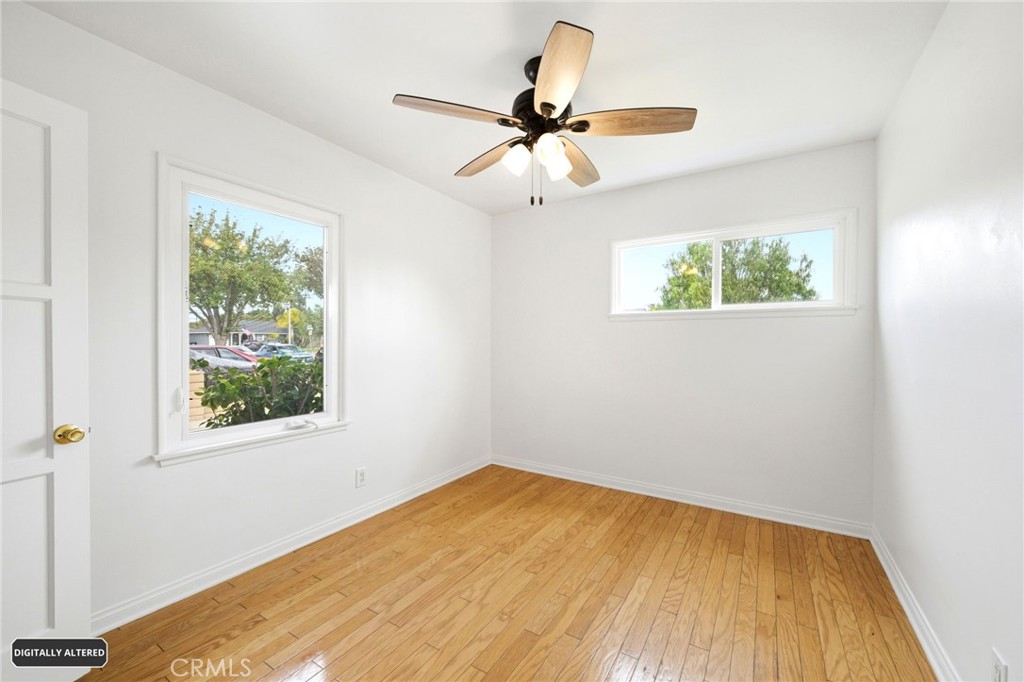 10539 Gridley Road Santa Fe Springs, CA 90670 - Photo 21 of 29 a view of a room with a window and a ceiling fan