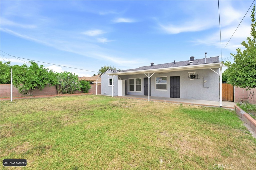 10539 Gridley Road Santa Fe Springs, CA 90670 - Photo 24 of 29 a front view of house with yard and green space