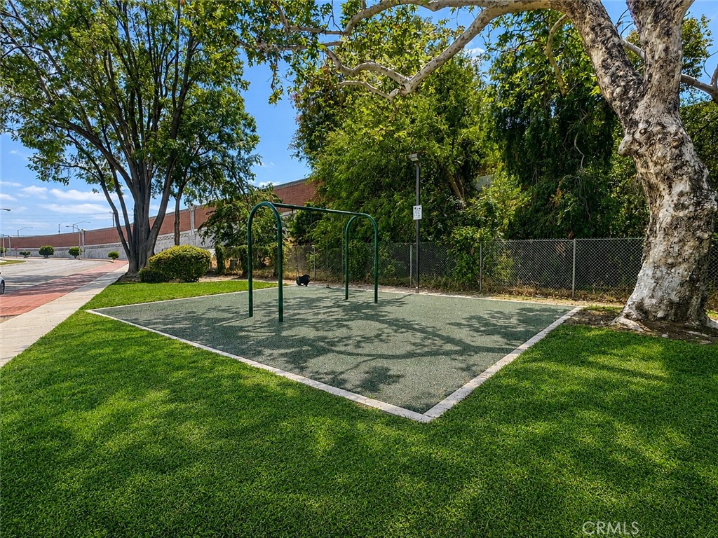 10539 Gridley Road Santa Fe Springs, CA 90670 - Photo 29 of 29 a view of a backyard with a garden