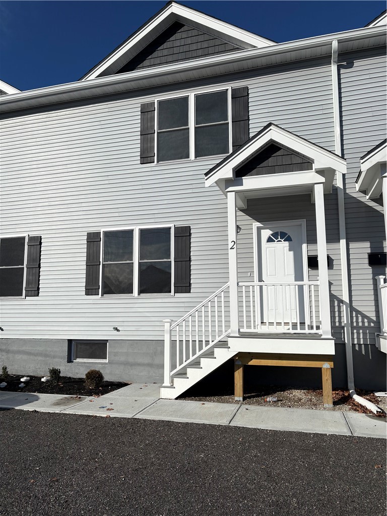 184 Avenue C, Unit M2 Woonsocket, RI 02895 - Photo 2 of 11 New Town House with assigned two parking spaces.