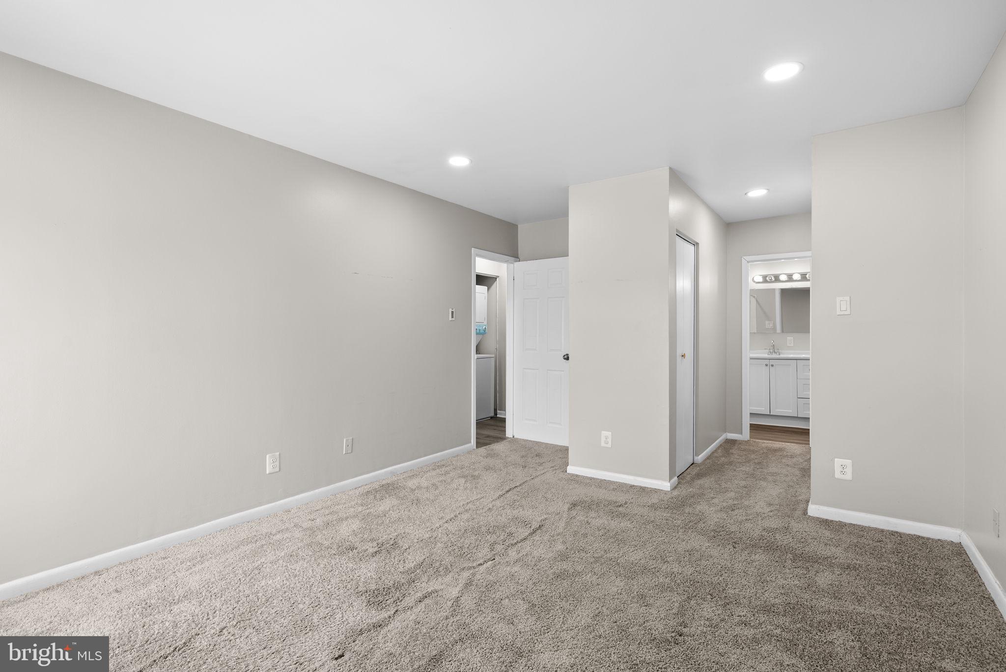 10121 Prince Place, Unit 30210B Upper Marlboro, MD 20774 - Photo 15 of 24 a view of an empty room