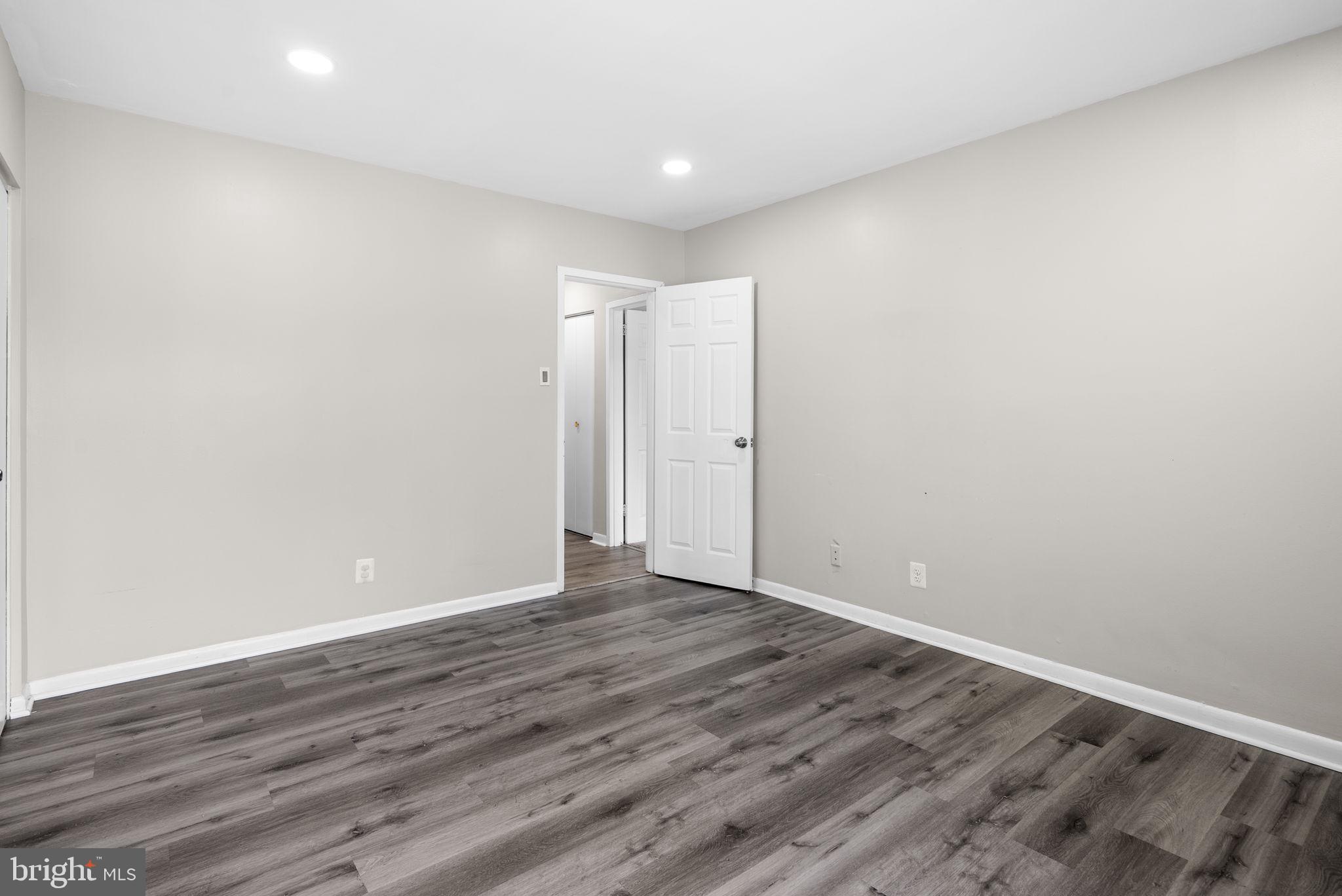 10121 Prince Place, Unit 30210B Upper Marlboro, MD 20774 - Photo 19 of 24 a view of an empty room