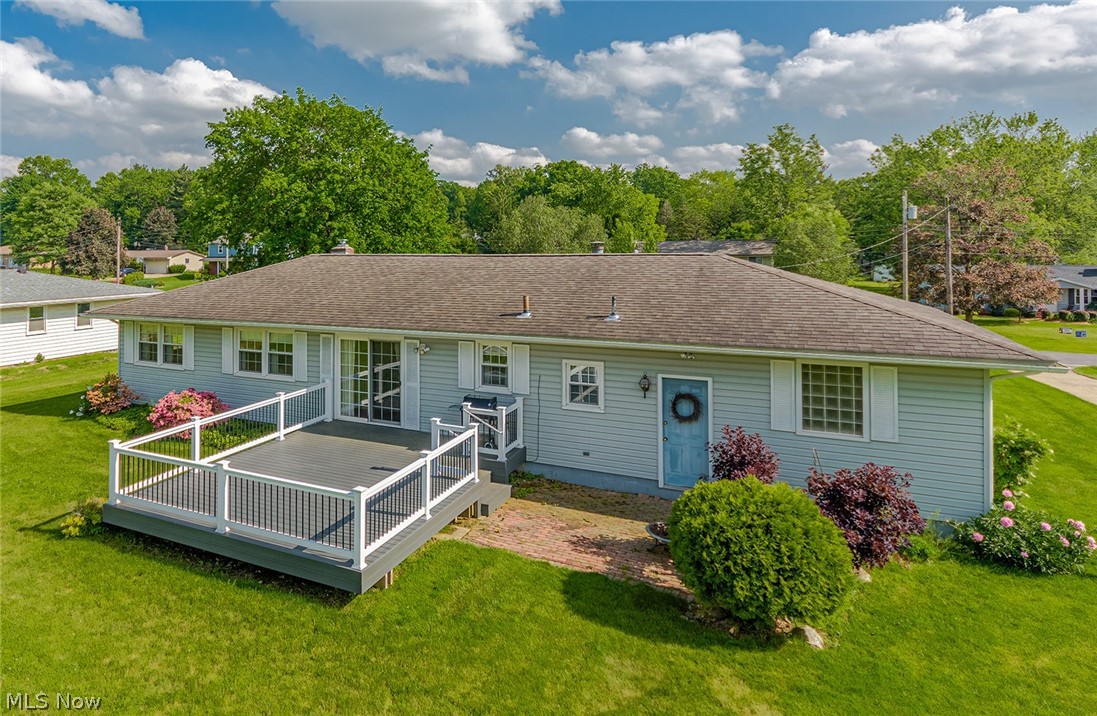 3331 Boyne Road Barberton, OH 44203 - Photo 17 of 22 Plenty of space where you can unwind in tranquility or host gatherings in style. The composite deck leads to a brick patio with access to the garage.