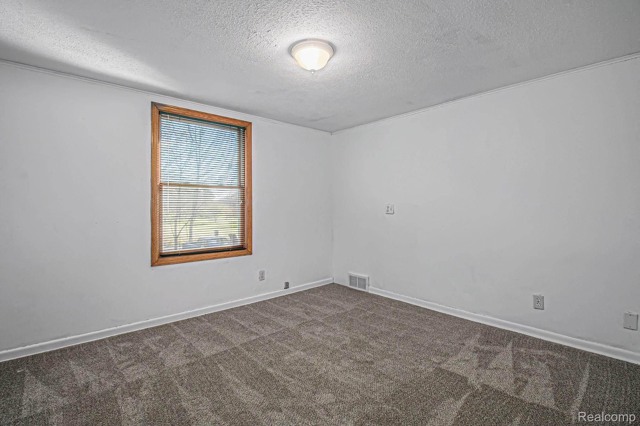 5891 Zimmer Road Williamston, MI 48895 - Photo 18 of 32 Upstairs Bedroom 2