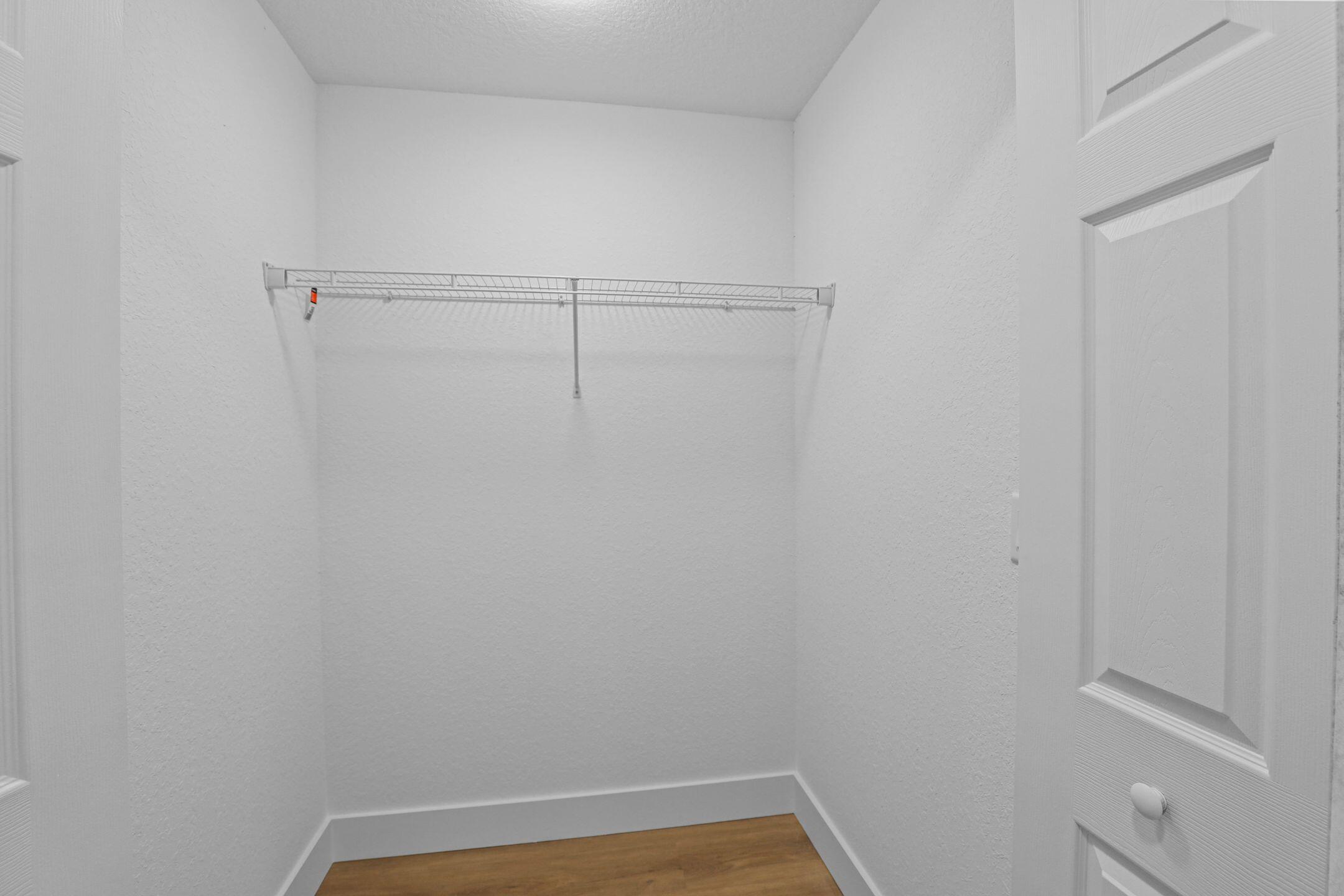 4611 Sunset Boulevard Fort Pierce, FL 34982 - Photo 14 of 28 a view of a room with racks on the wall