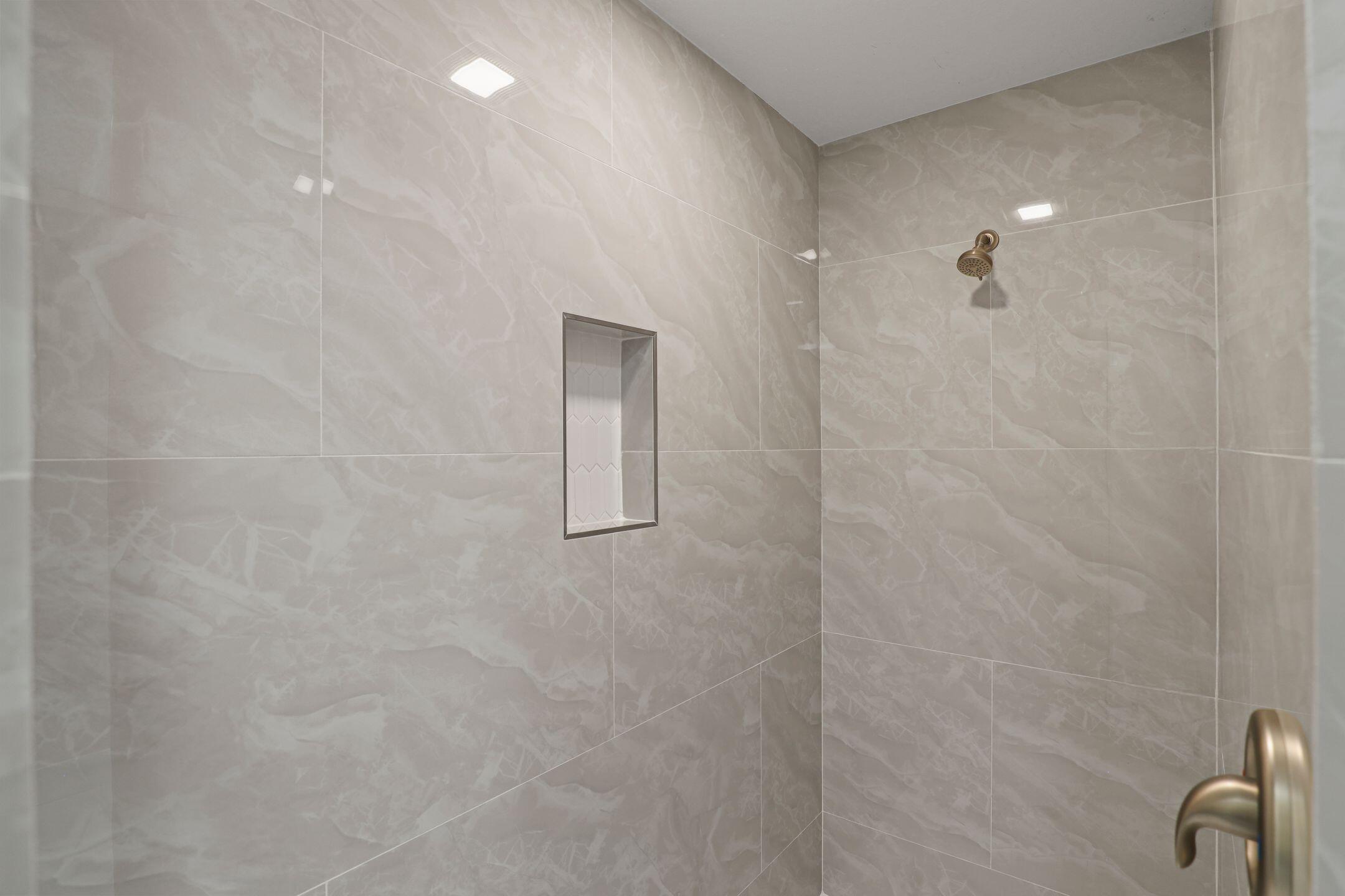 4611 Sunset Boulevard Fort Pierce, FL 34982 - Photo 17 of 28 a bathroom with a shower