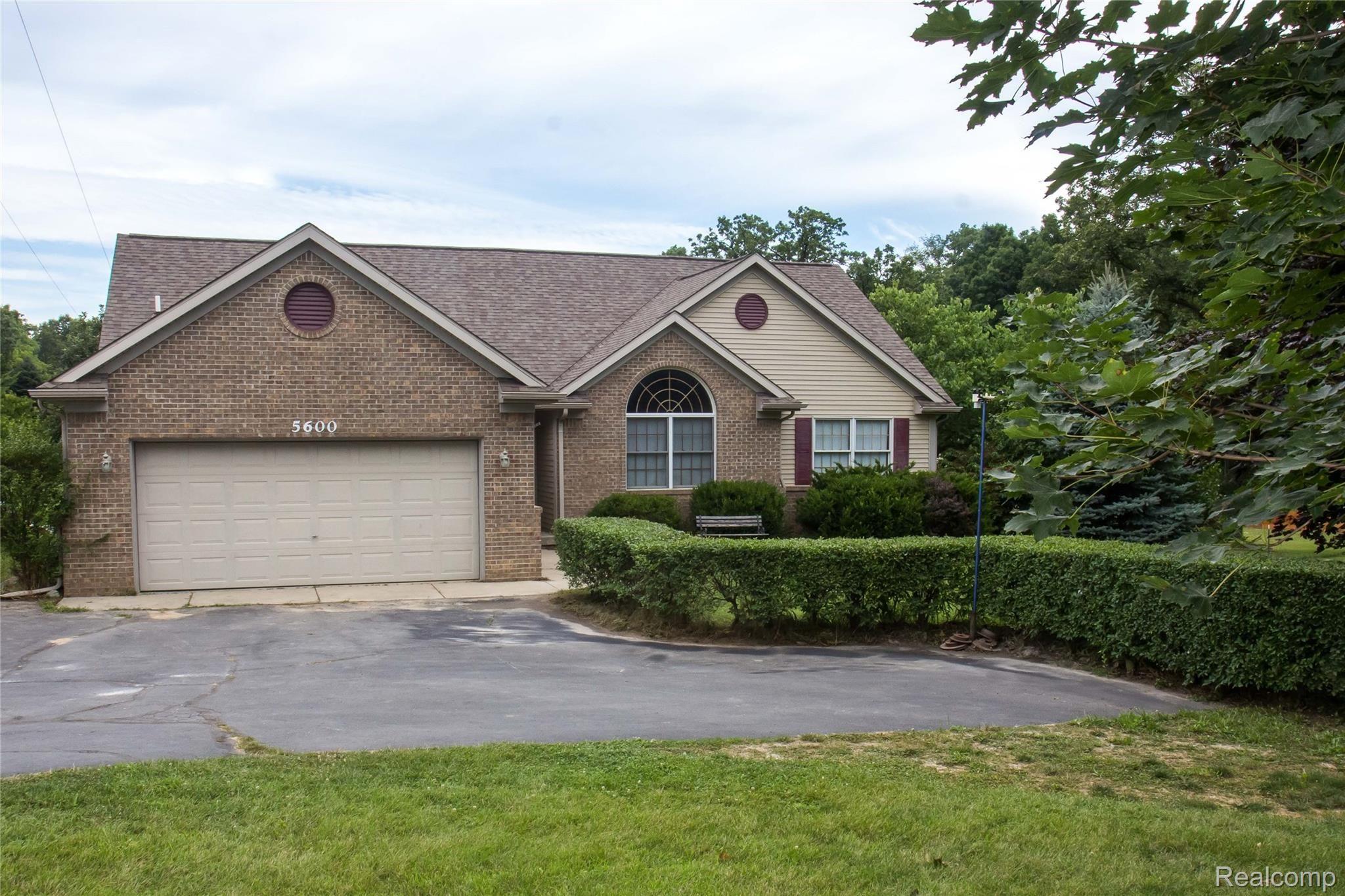 5600 West Coon Lake Road Howell, MI 48843 - Photo 22 of 22 front3.jpg
