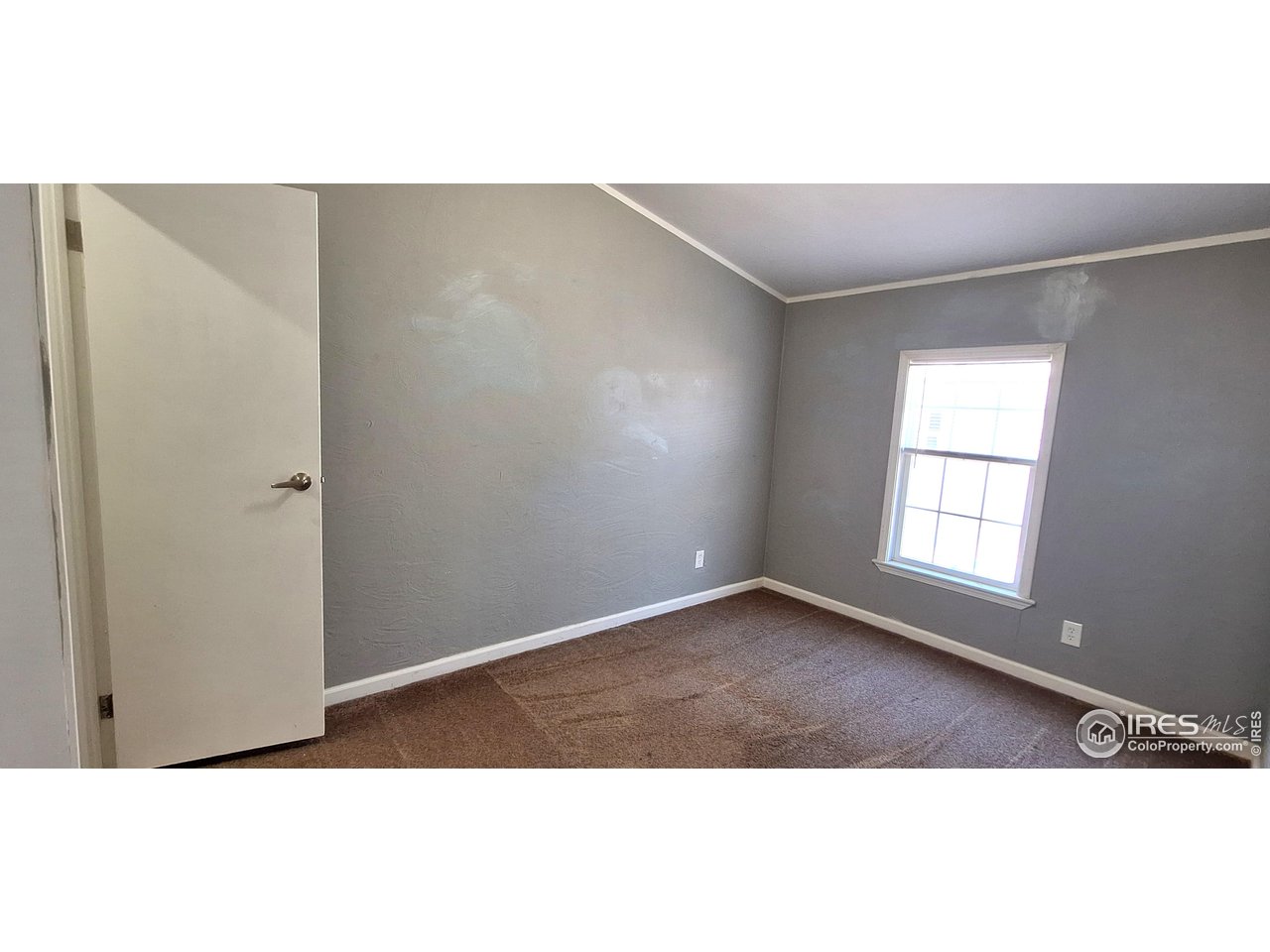 2500 East Harmony Road, Unit 439 Fort Collins, CO 80528 - Photo 11 of 13 a view of an empty room with a window