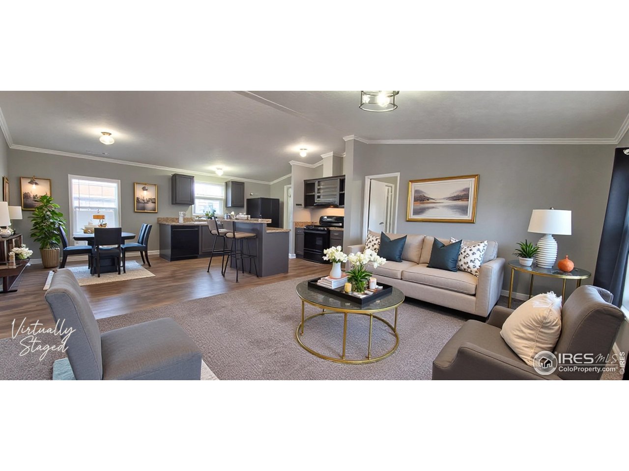 2500 East Harmony Road, Unit 439 Fort Collins, CO 80528 - Photo 5 of 13 a living room with furniture kitchen view and a table