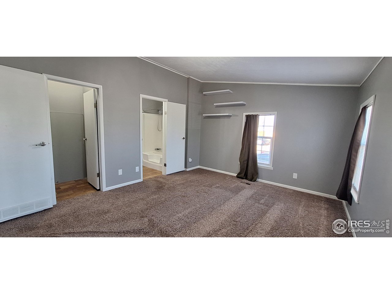 2500 East Harmony Road, Unit 439 Fort Collins, CO 80528 - Photo 7 of 13 a view interior of a house and an empty room