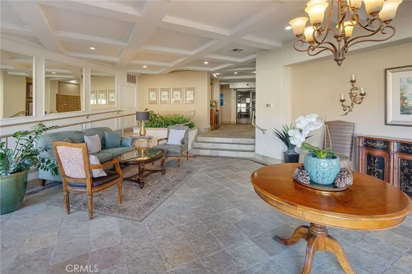 a view of entryway with a livingroom and a bathroom
