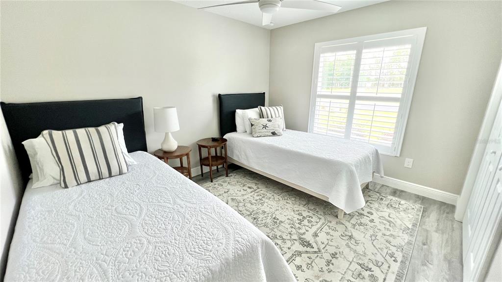 6944 Southwest 179th Ave Road Dunnellon, FL 34432 - Photo 14 of 19 a large bed sitting in a bedroom next to a window