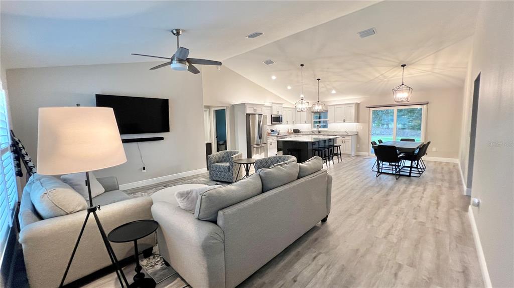 6944 Southwest 179th Ave Road Dunnellon, FL 34432 - Photo 9 of 19 a living room with furniture and a wooden floor