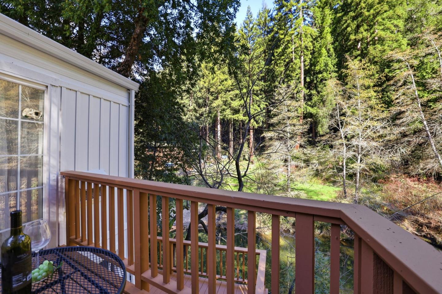 265 Brown Gables Road, Unit 11 Ben Lomond, CA 95005 - Photo 21 of 50 a view of a balcony with wooden fence and floor