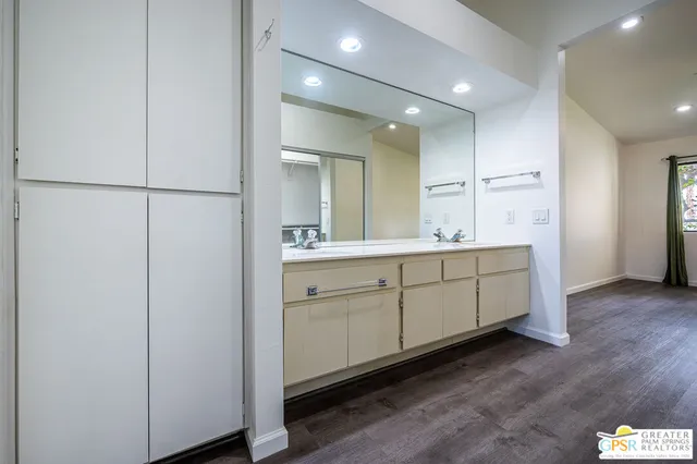 a view of a bench in the garden