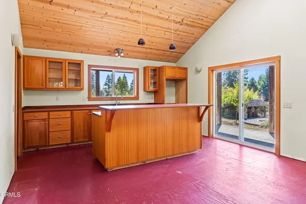 a kitchen that has a sink and a window
