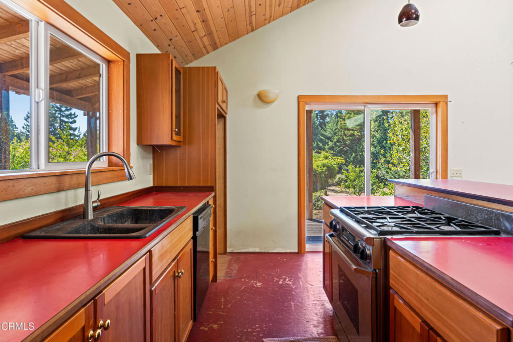 28580 Comptche Ukiah Road Comptche, CA 95427 - Photo 16 of 56 a kitchen that has a sink and a window