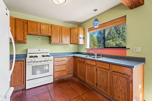 a view of a balcony with chairs