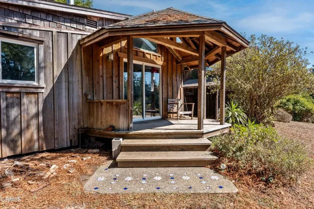 a kitchen with a refrigerator sink and cabinets