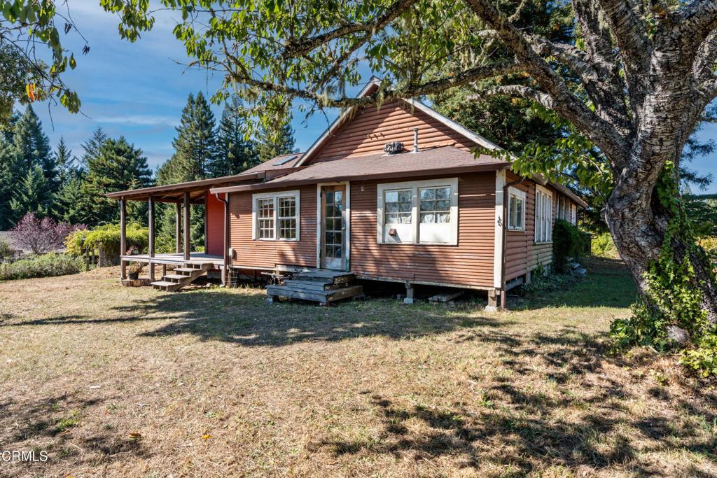 28580 Comptche Ukiah Road Comptche, CA 95427 - Photo 4 of 56 a front view of a house with garden