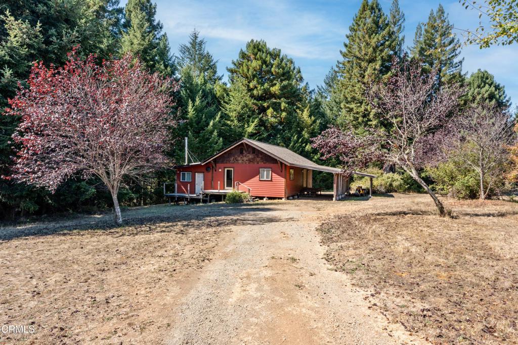 28580 Comptche Ukiah Road Comptche, CA 95427 - Photo 43 of 56 a house with trees in the background
