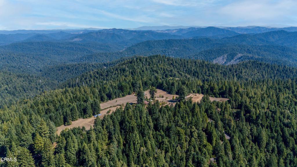 28580 Comptche Ukiah Road Comptche, CA 95427 - Photo 45 of 56 a view of a lush green hillside and a mountain view