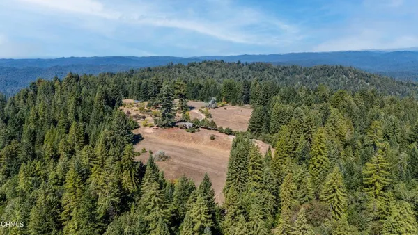 a view of a balcony with wooden floor