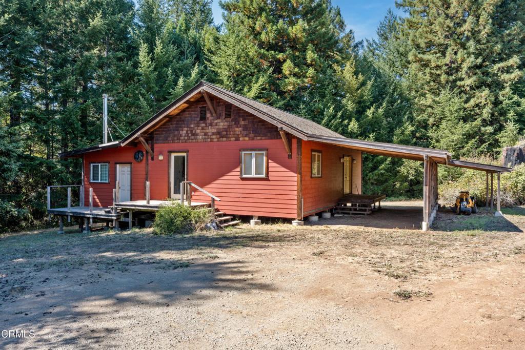 28580 Comptche Ukiah Road Comptche, CA 95427 - Photo 7 of 56 a view of a house with a yard