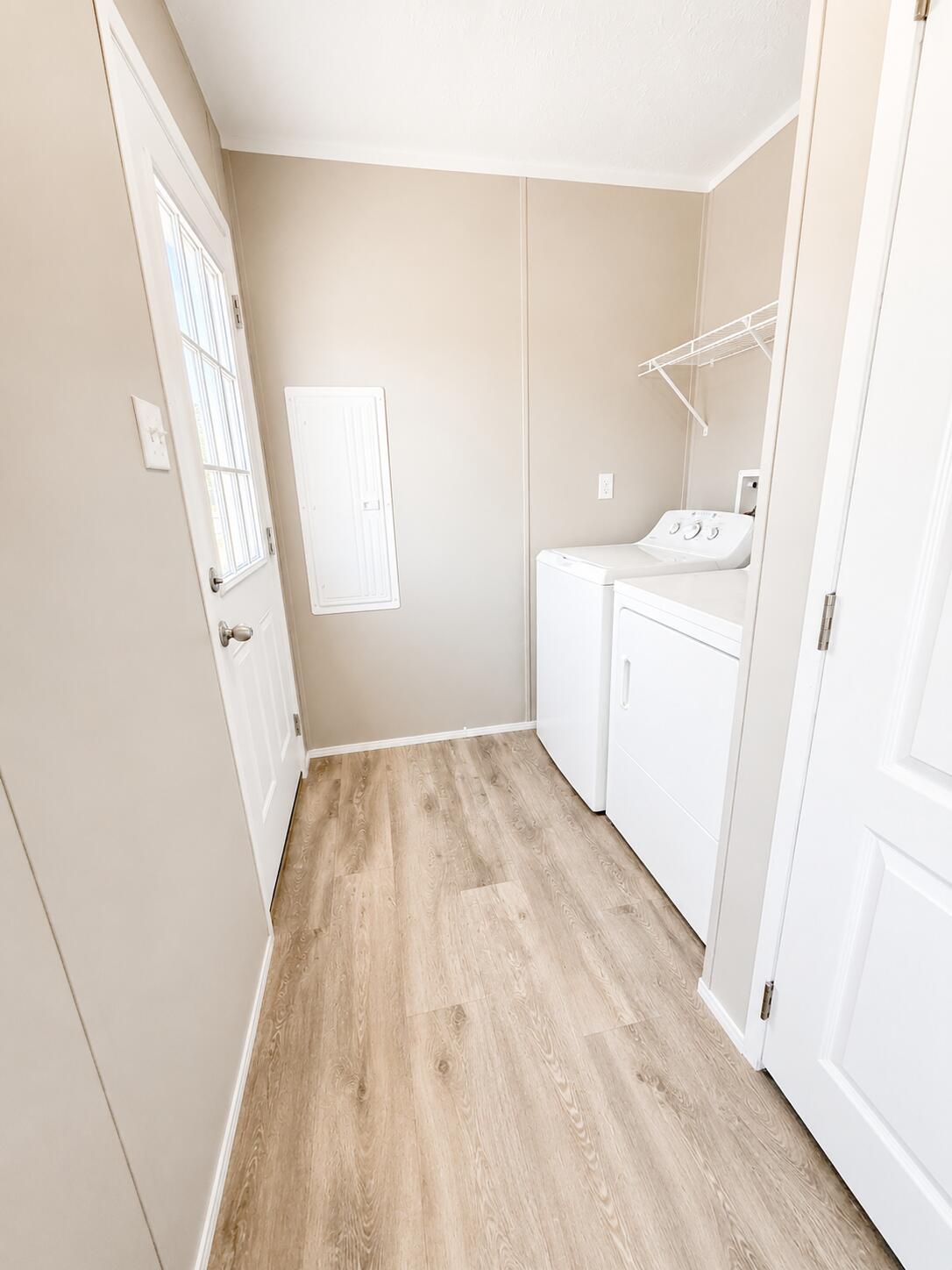 1121 Orange Loop Okeechobee, FL 34974 - Photo 24 of 33 Bright Minimalist Laundry Room