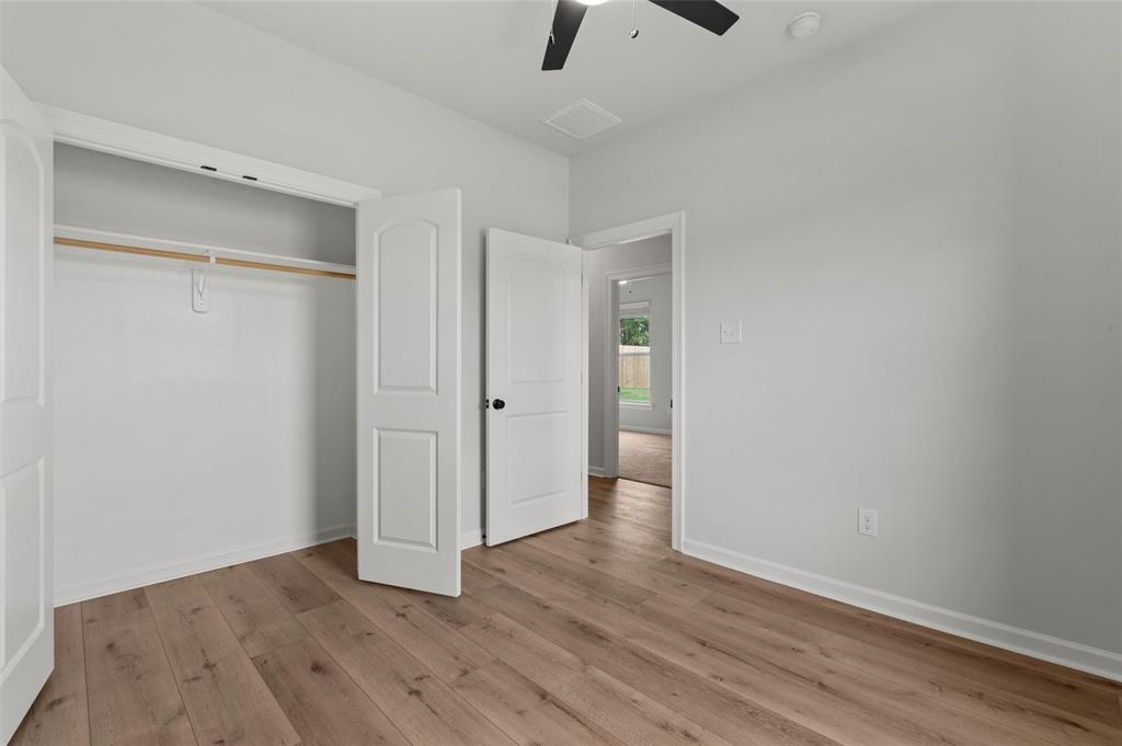 1269 BAYOU BAY Court Frierson, LA 71027 - Photo 26 of 30 a view of an empty room with wooden floor