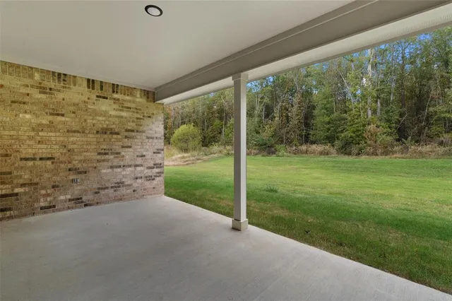 a view of a garden with an outdoor space