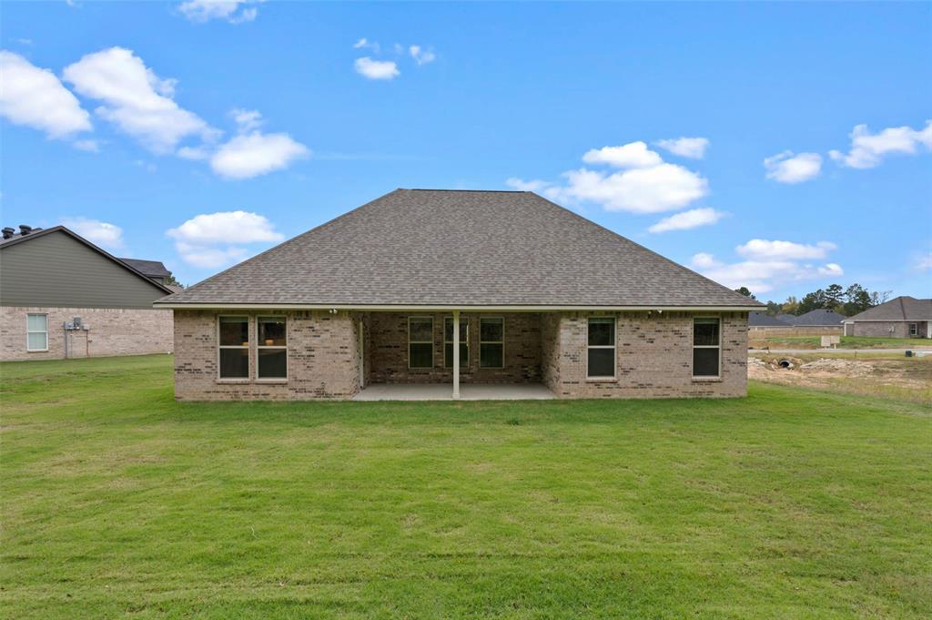 1269 BAYOU BAY Court Frierson, LA 71027 - Photo 30 of 30 a view of a house with a yard