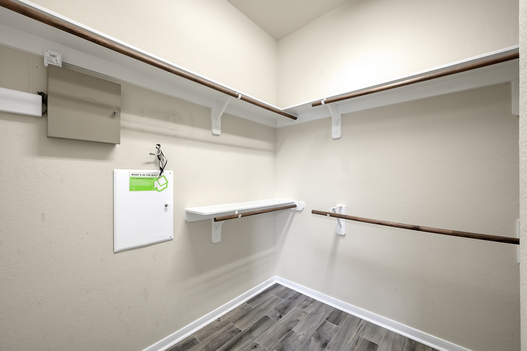 12419 Adams Ridge Lane Humble, TX 77346 - Photo 23 of 46 a view of a room with racks on the wall