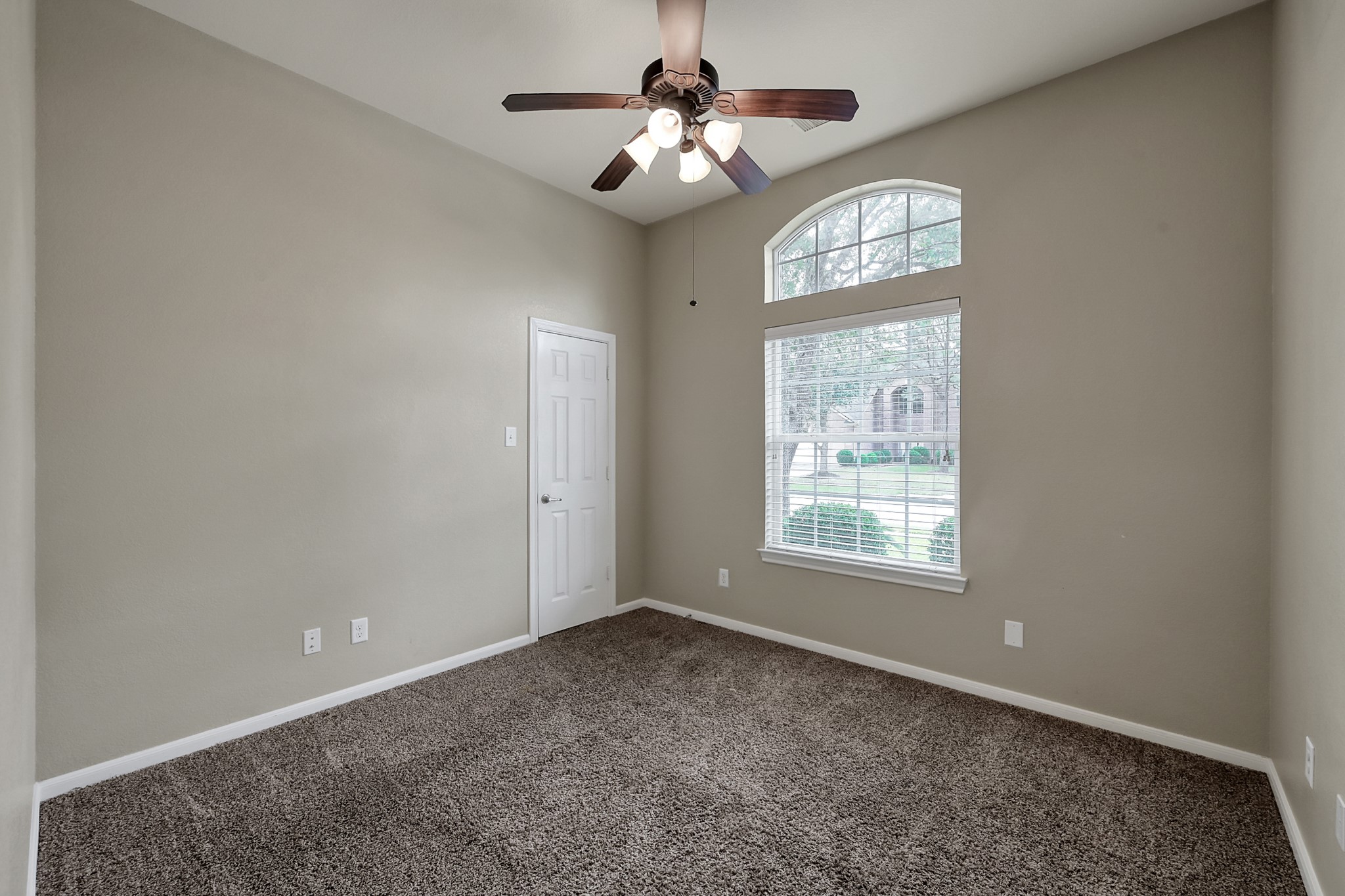 12419 Adams Ridge Lane Humble, TX 77346 - Photo 24 of 46 a view of an empty room with a window