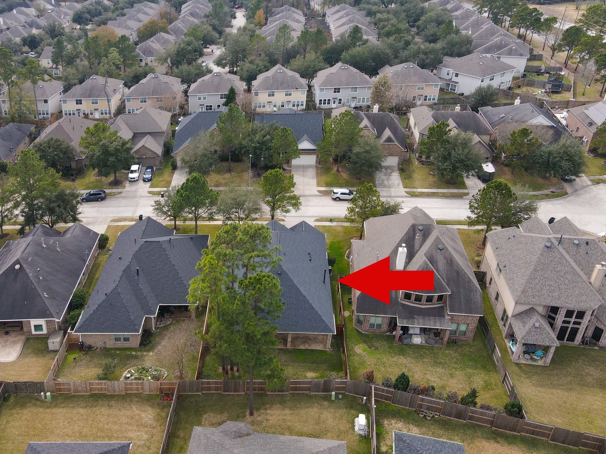 12419 Adams Ridge Lane Humble, TX 77346 - Photo 41 of 46 an aerial view of residential houses with outdoor space