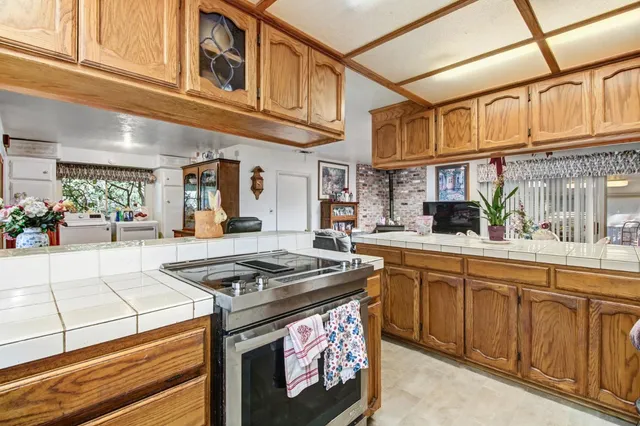 a bedroom with a bed and a table in it