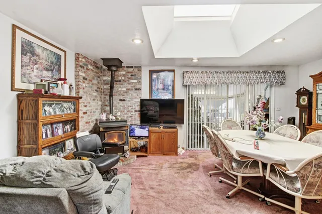 a bedroom with a bed and furniture