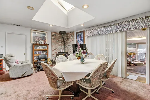 a bedroom with furniture and wooden floor