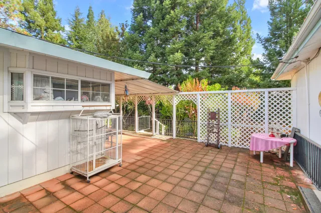 a kitchen with a sink stove top oven and cabinets